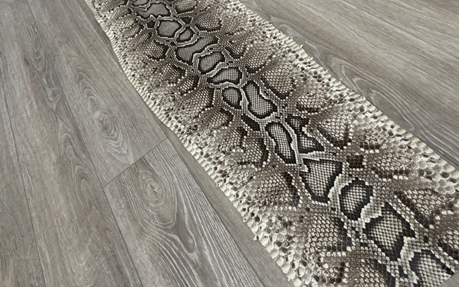 Genuine burmese python leather showing natural texture, pattern, and markings